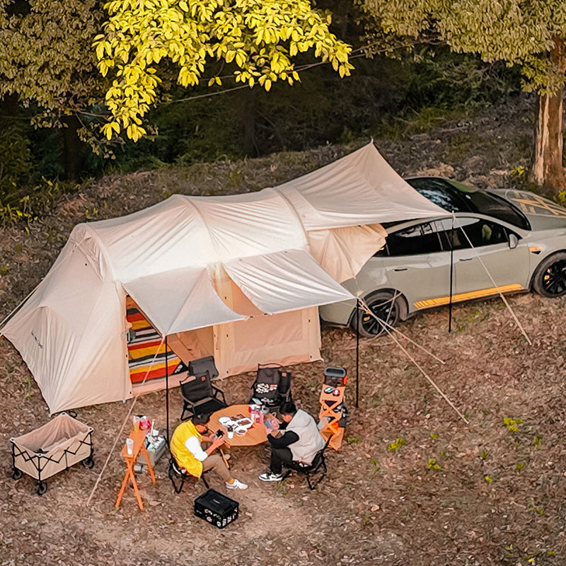 Explosively vibrant inflatable roof tent makes small car a mini-camper